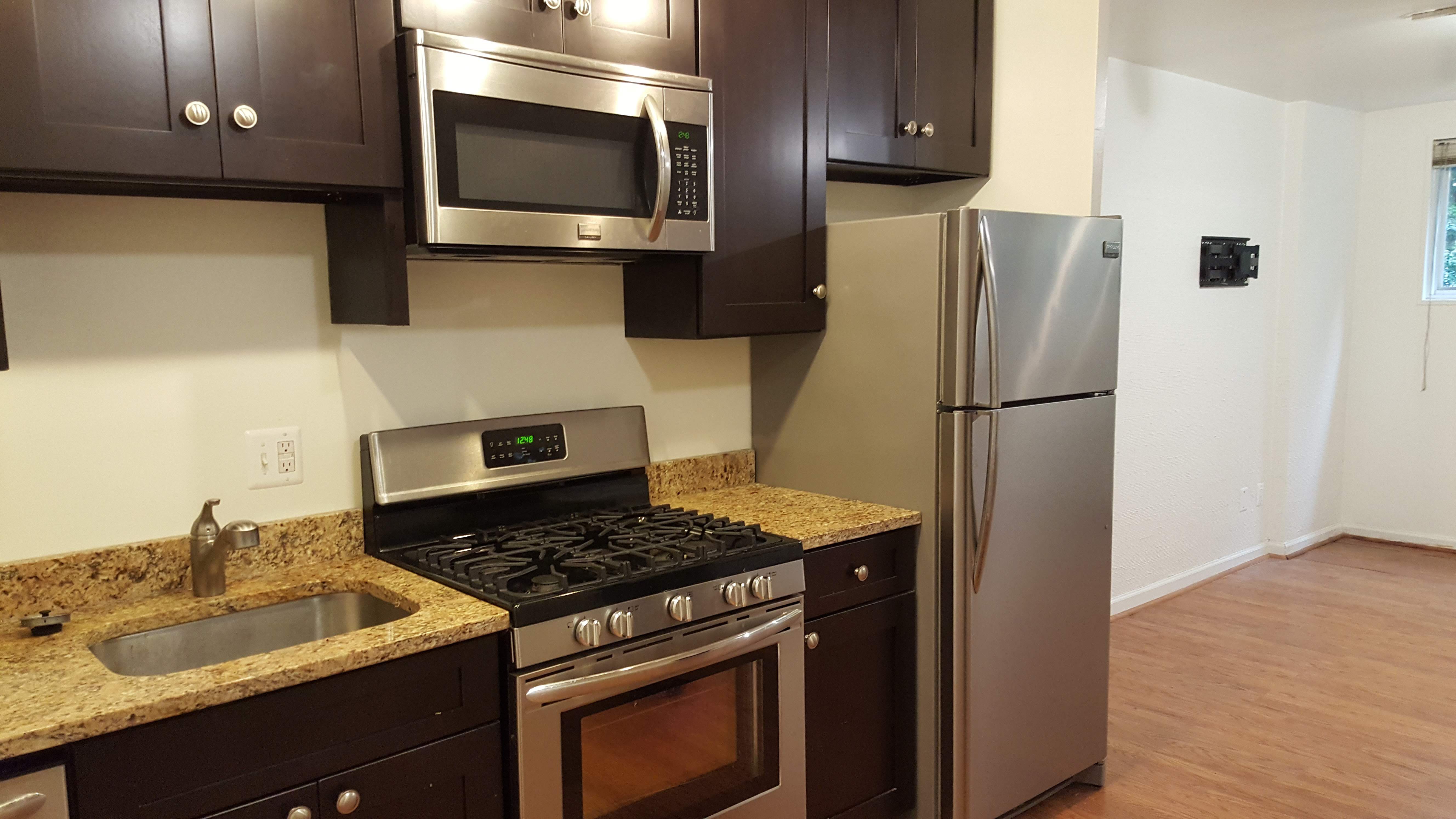 What's the cheapest rental available in Woodley Park, right now?